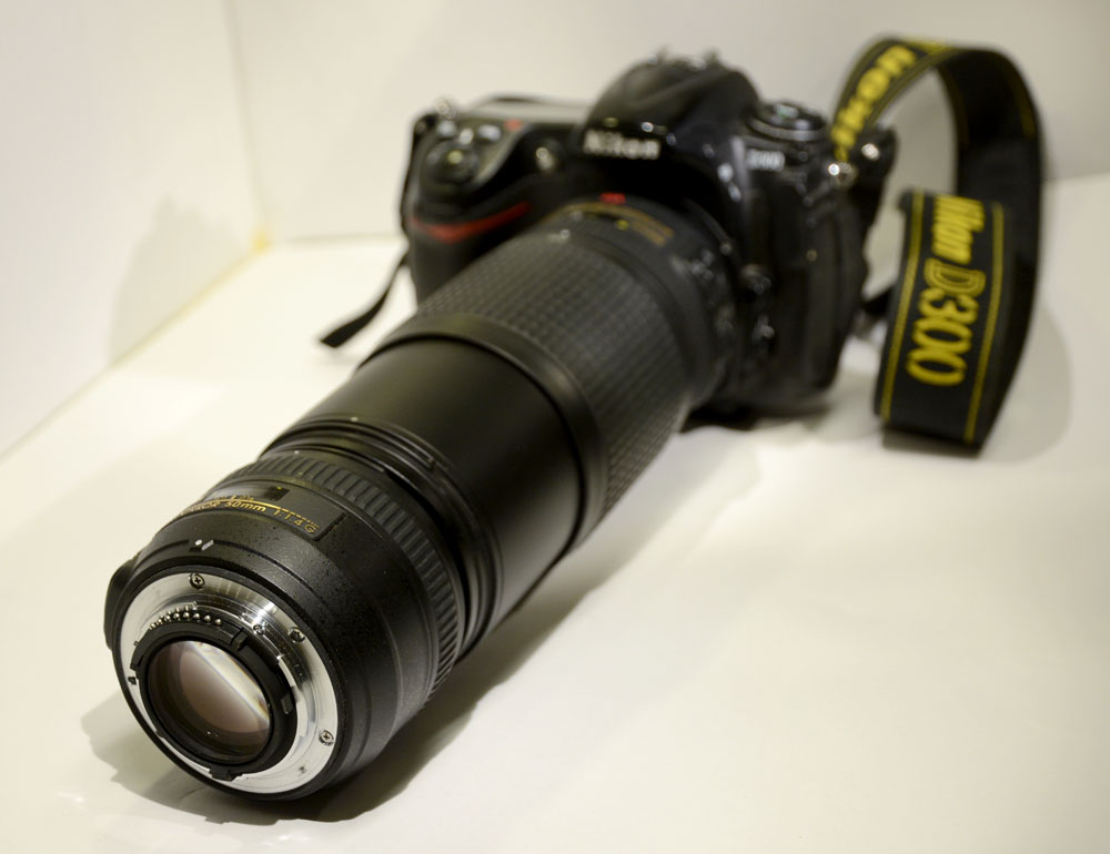 50 mm lens in front of 70-300 mm lens.