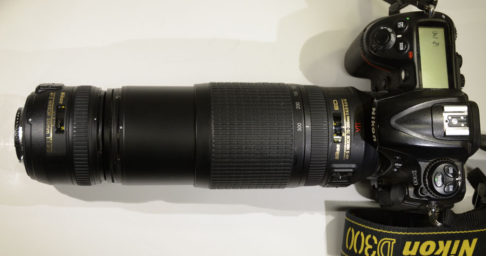 50 mm lens in front of 70-300 mm lens.