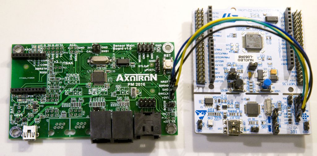 ST-Link of a Nucleo board connected to the target board.
